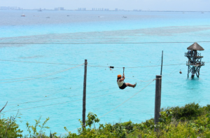 Zip lining over the Caribbean Sea is one of the main attractions at Garrafon Park.